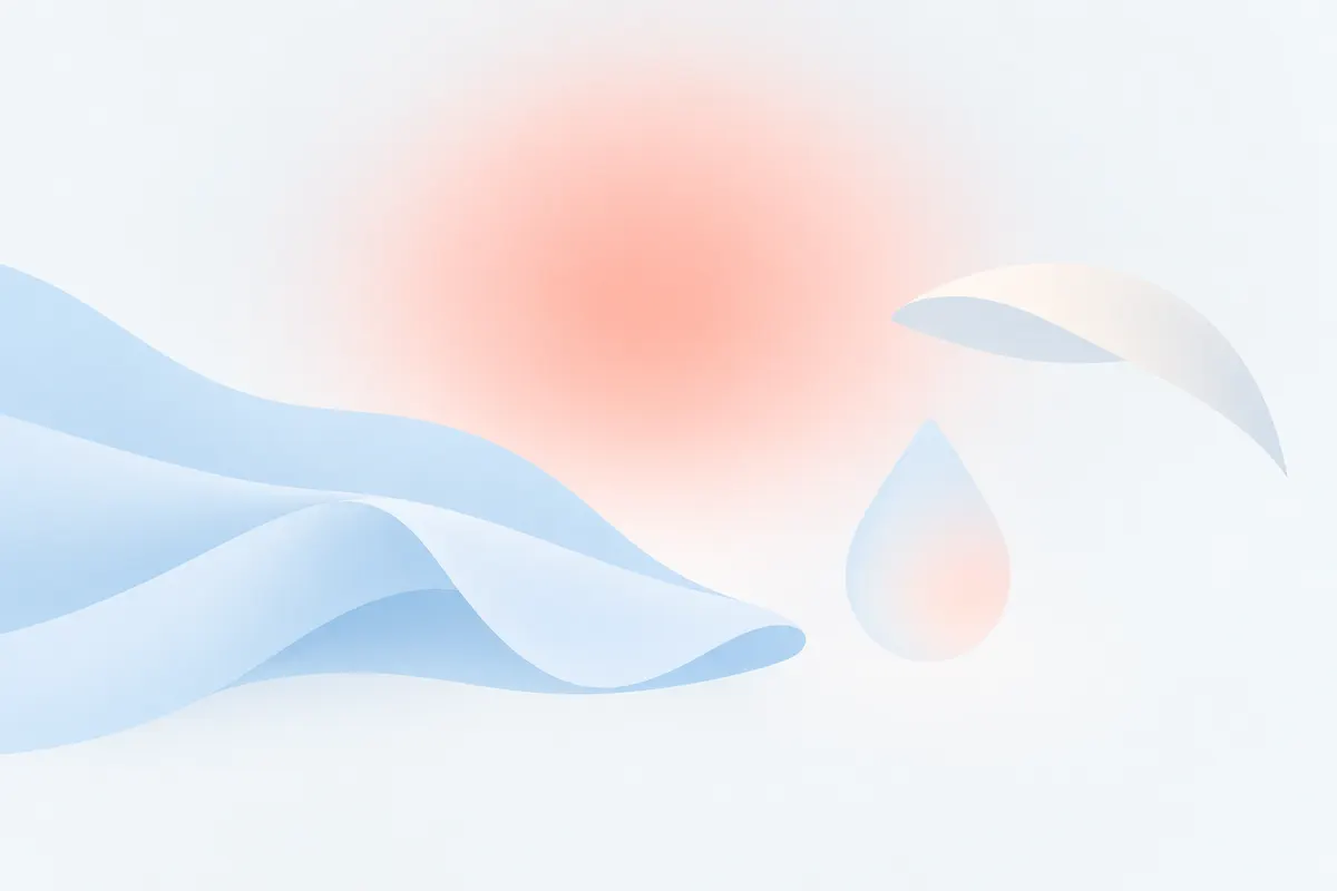 A folded pale blue cloth, a clear droplet shape and a small canopy arc arranged over a fading coral glow